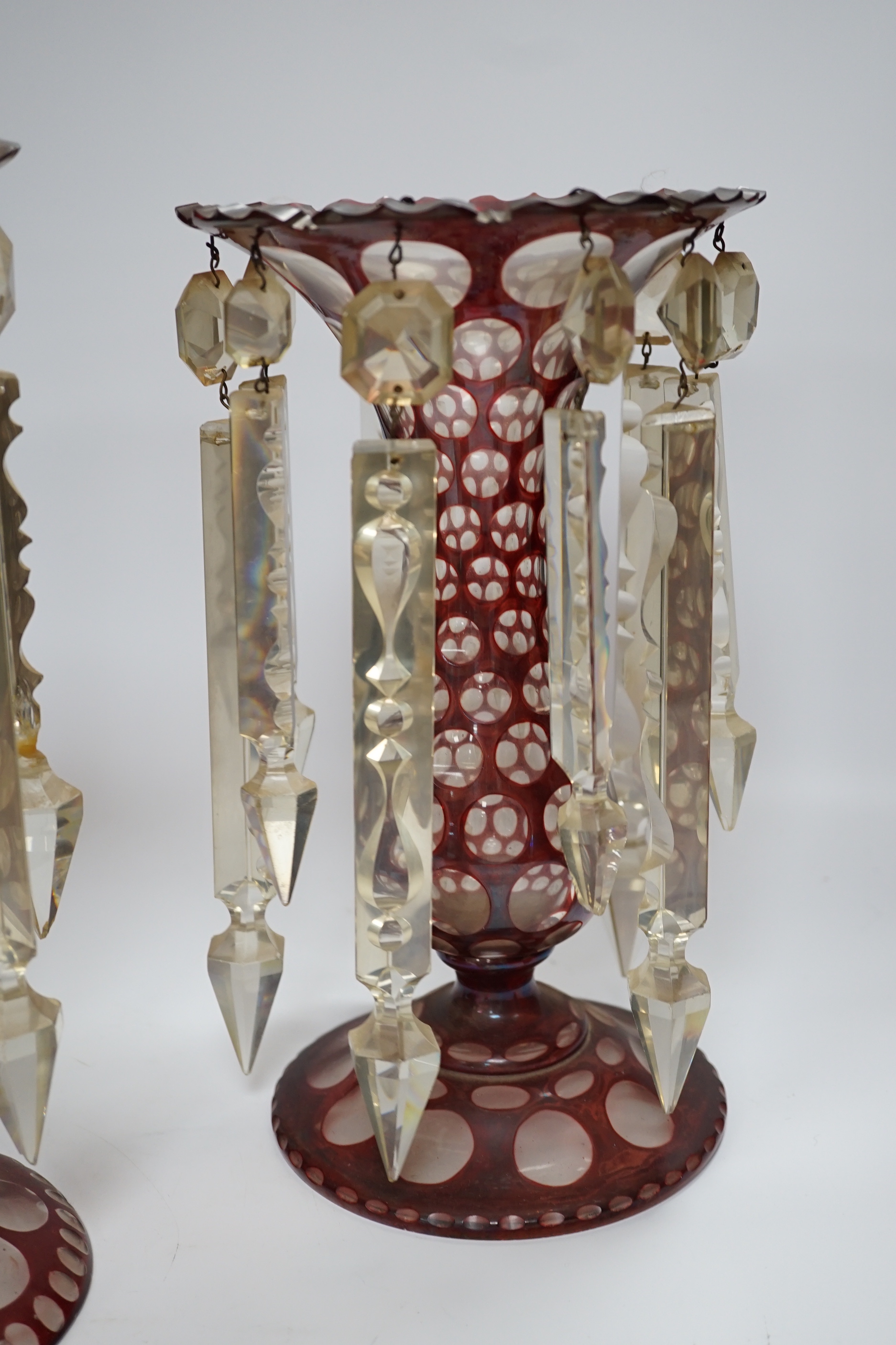 A pair of late 19th century Bohemian ruby flashed glass lustres, 30cm tall